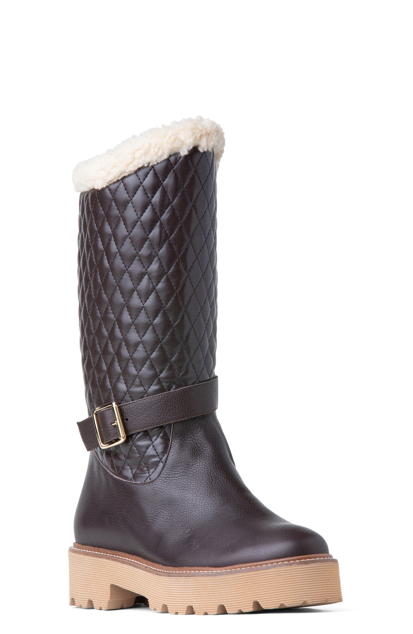 A brown leather winter knee-high boot with a faux-fur cuff and a quilted pattern on the upper portion. It features a gold-toned buckle on the ankle strap and a lug sole.